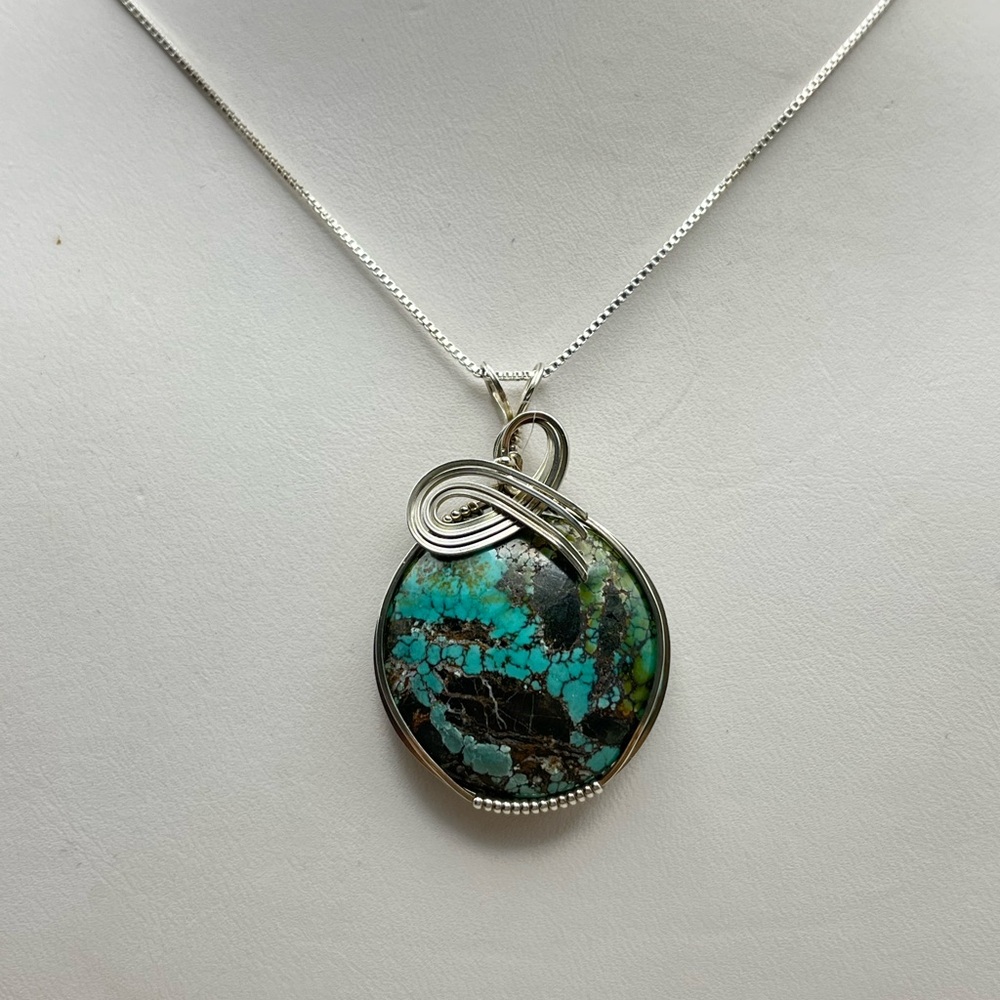 Elegant Silver and Turquoise Pendant Necklace